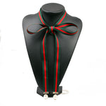 Load image into Gallery viewer, Green and Red Statement Ribbon Necklace with Pearl Drops