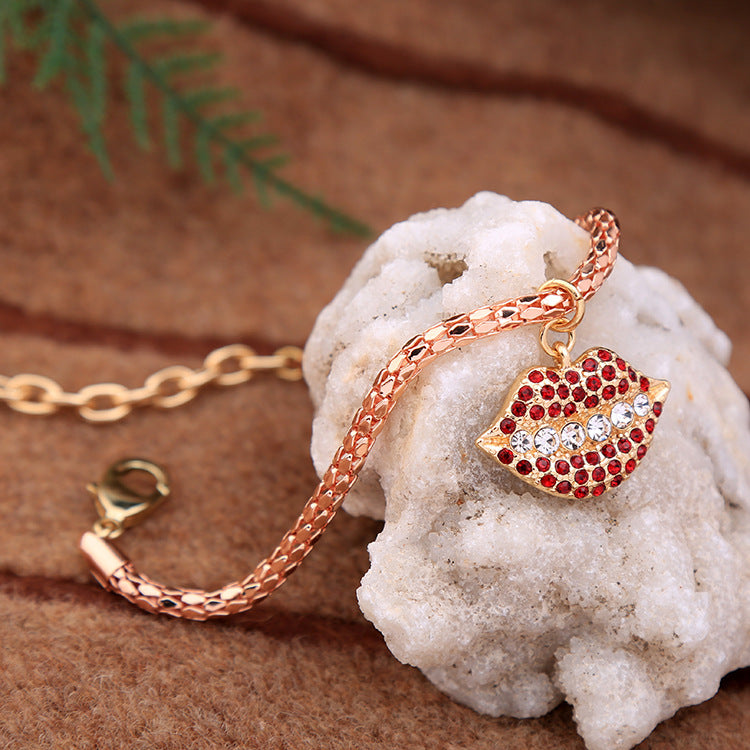 Rose Tone 'Lips" Clasp Bracelet