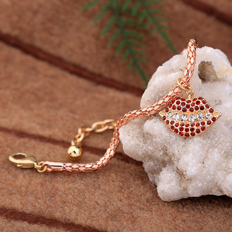 Rose Tone 'Lips" Clasp Bracelet