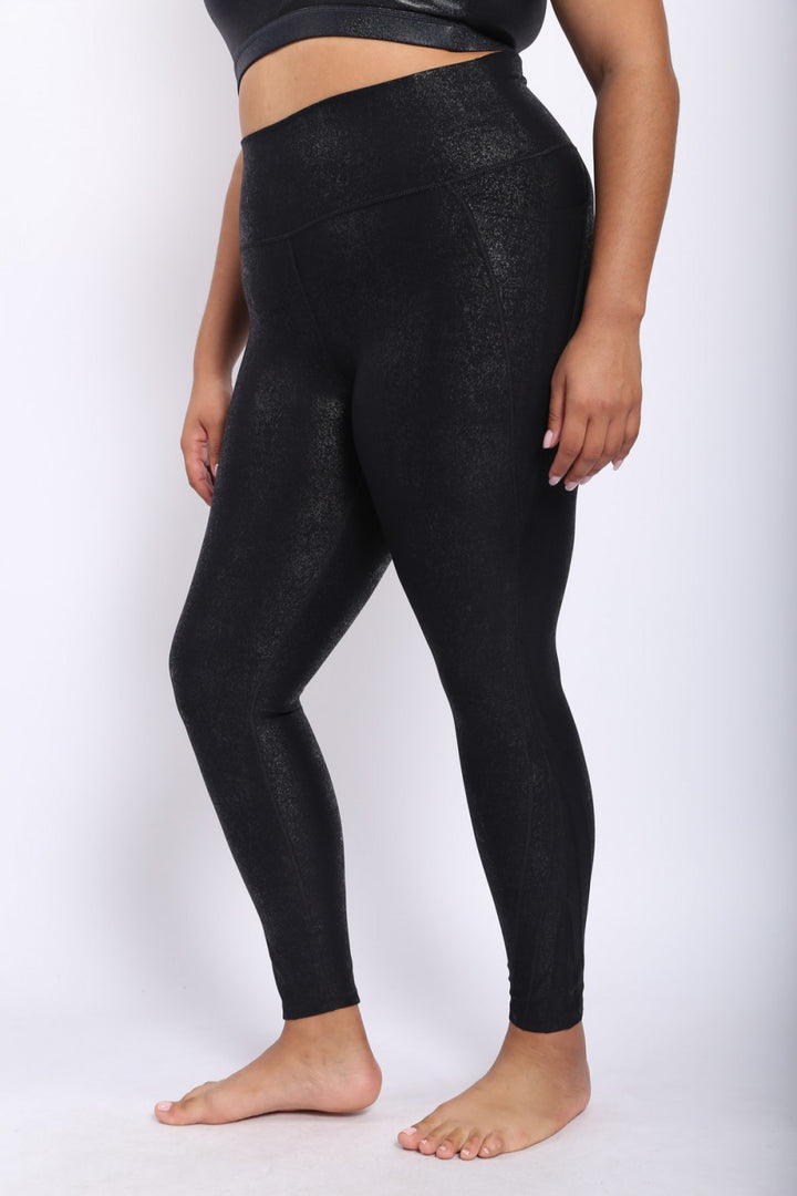 CURVY Highwaisted Foil Leggings With Side Pockets Fabric 88% polyester 12% spandex C.O.O These highwaisted foil leggings feature useful side pockets along with seam details to compliment this unique fabric. 88% polyester 12% spandex Tummy control. Moisture wicking. Four-way stretch. 